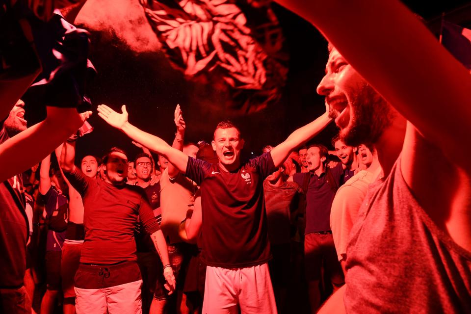 <p>People celebrate France’s victory in central Marseille on July 10, 2018 after the final whistle of the Russia 2018 World Cup semi-final football match between France and Belgium. (Photo by Anne-Christine POUJOULAT / AFP) </p>