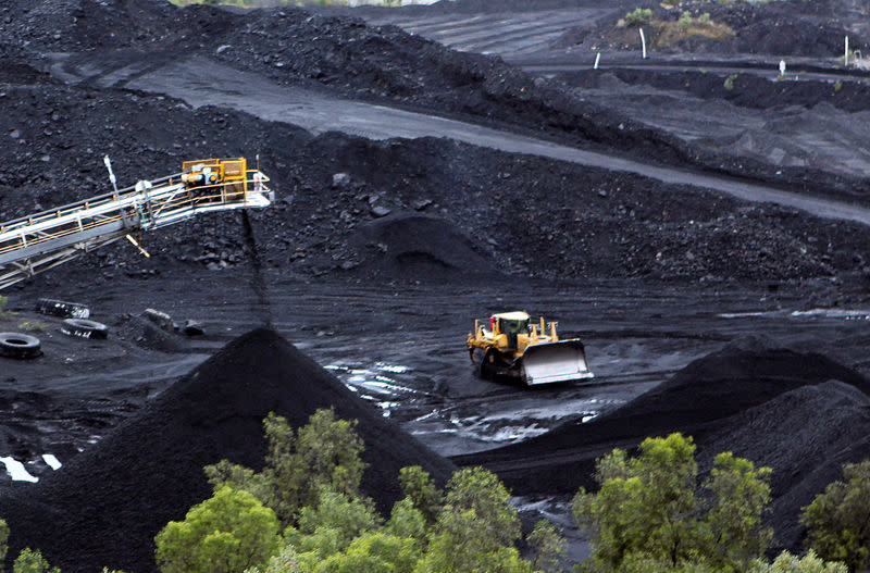 Coal is stockpiled at the Blair Athol mine in the Bowen Basin coalfield near the town of Moranbah, Australia, June 1, 2012. REUTERS/James Regan/File Photo
