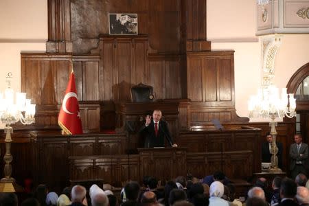 FILE PHOTO: Turkish President Tayyip Erdogan makes a speech at the old parliament building in Ankara, Turkey July 13, 2018. REUTERS/Umit Bektas/File Photo