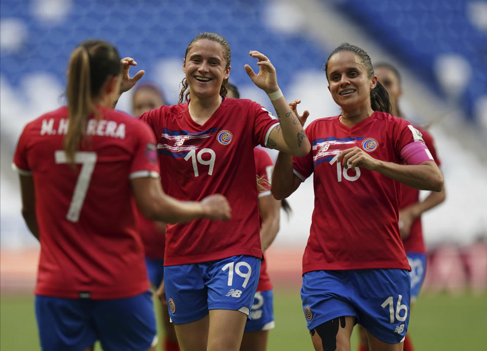 Costa Rica's Maria Paula Salas, center, is congratulated by her teammates after scoring the team's second goal against Panama during a CONCACAF Women's Championship soccer match in Monterrey, Mexico, Tuesday, July 5, 2022. (AP Photo/Fernando Llano)