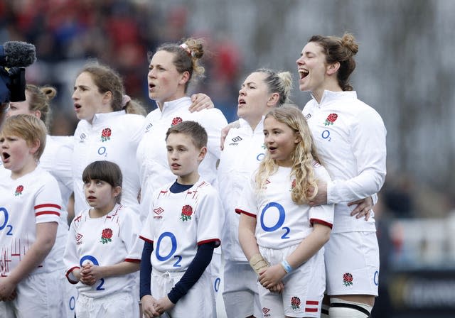 Sarah Hunter (right) sings the national anthem ahead of her farewell England appearance in Newcastle