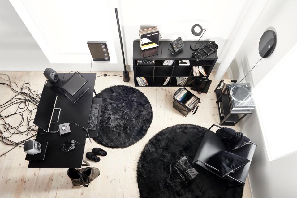 Swedish House Mafia's IKEA collection of rugs, a desk, and armchair from the top view