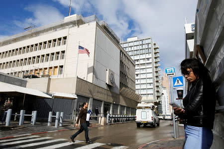 FILE PHOTO: Pedestrians are seen near the U.S. Embassy in Tel Aviv, Israel December 6, 2017. REUTERS/Amir Cohen/File Photo