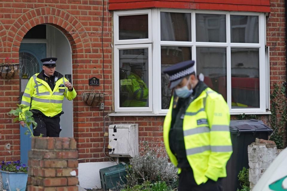 Police officers at the scene of a house fire on Windsor Road, Ilford, where Anna Karen, the last surviving star of the hit ITV sitcom On The Buses, has died at the age of 85. (PA)