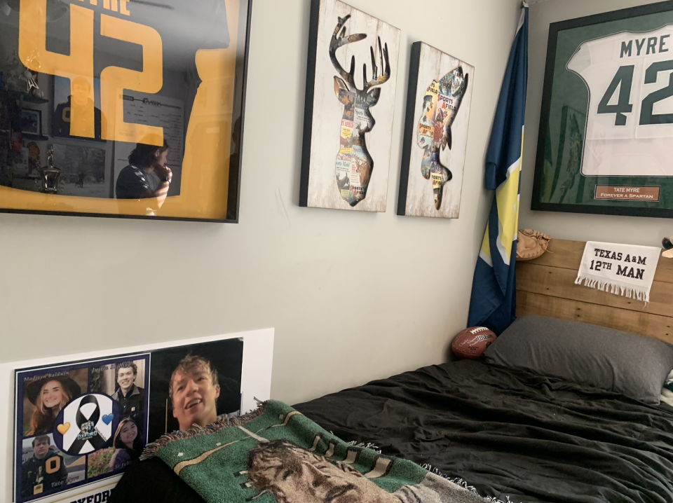 Several '42' jerseys line the walls inside Tate Myre's bedroom, including one from Michigan State. (Yahoo Sports)