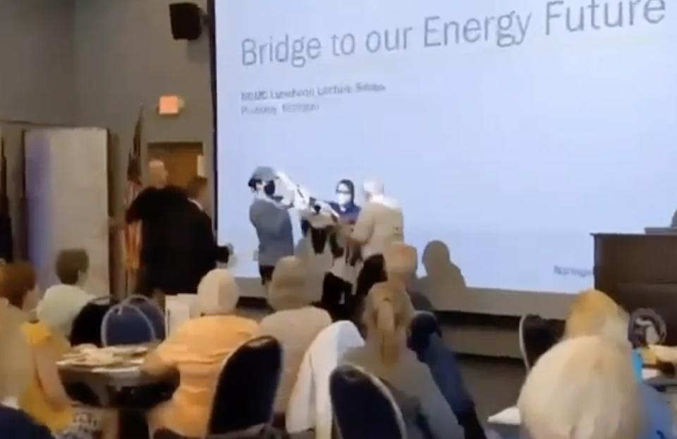 This video screenshot shows a confrontation between Line 5 protesters and NCMC officials at the Enbridge Luncheon Lecture on June 22, 2023.