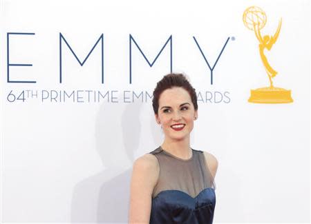 British actress Michelle Dockery of the drama series "Downton Abbey" arrives at the 64th Primetime Emmy Awards in Los Angeles in this September 23, 2012 file photo. REUTERS/Mario Anzuoni/Files