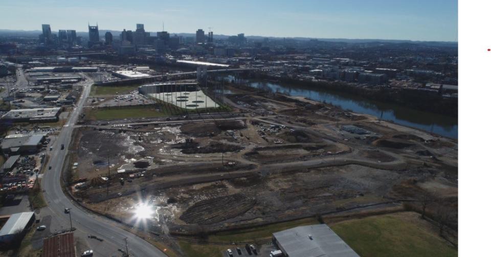 Downtown Nashville can be seen across the river from the east bank, set for redevelopment.