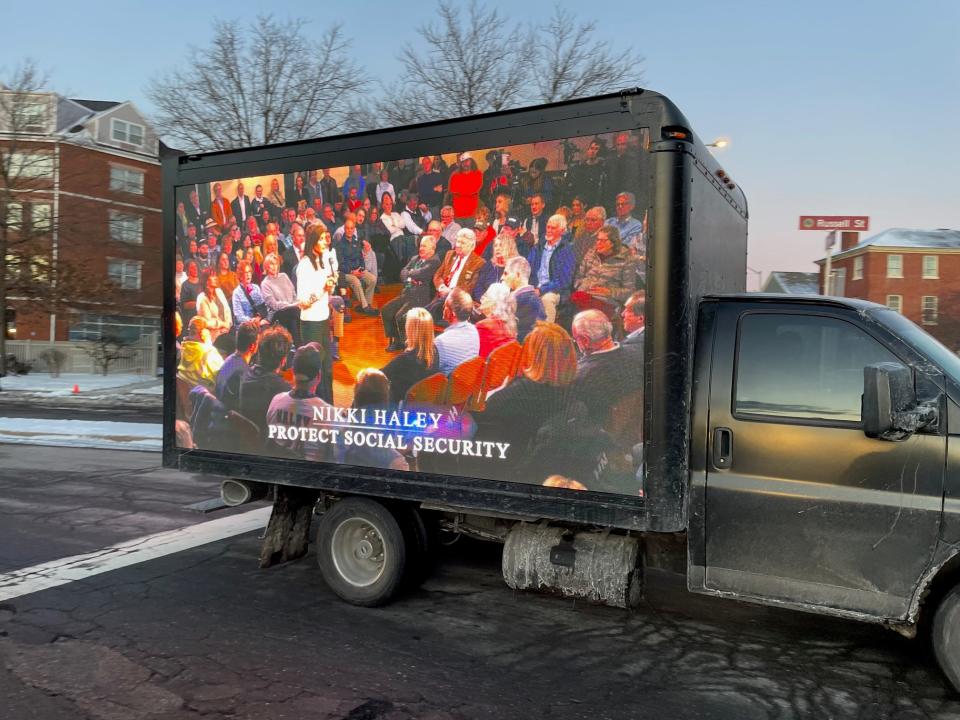 A truck with a digital billboard in support of Republican presidential candidate Nikki Haley circles around Portsmouth near where Donald Trump was set to speak Wednesday, Jan. 17, 2024.