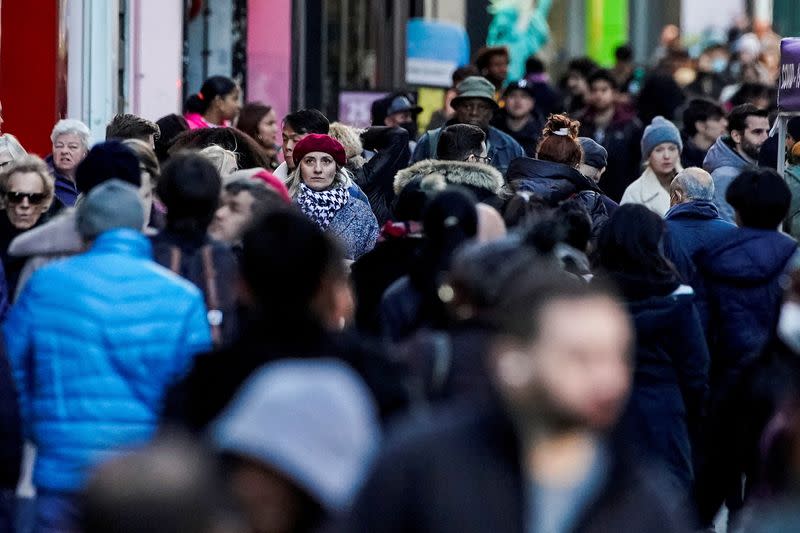 FILE PHOTO: People walk on a New York City street