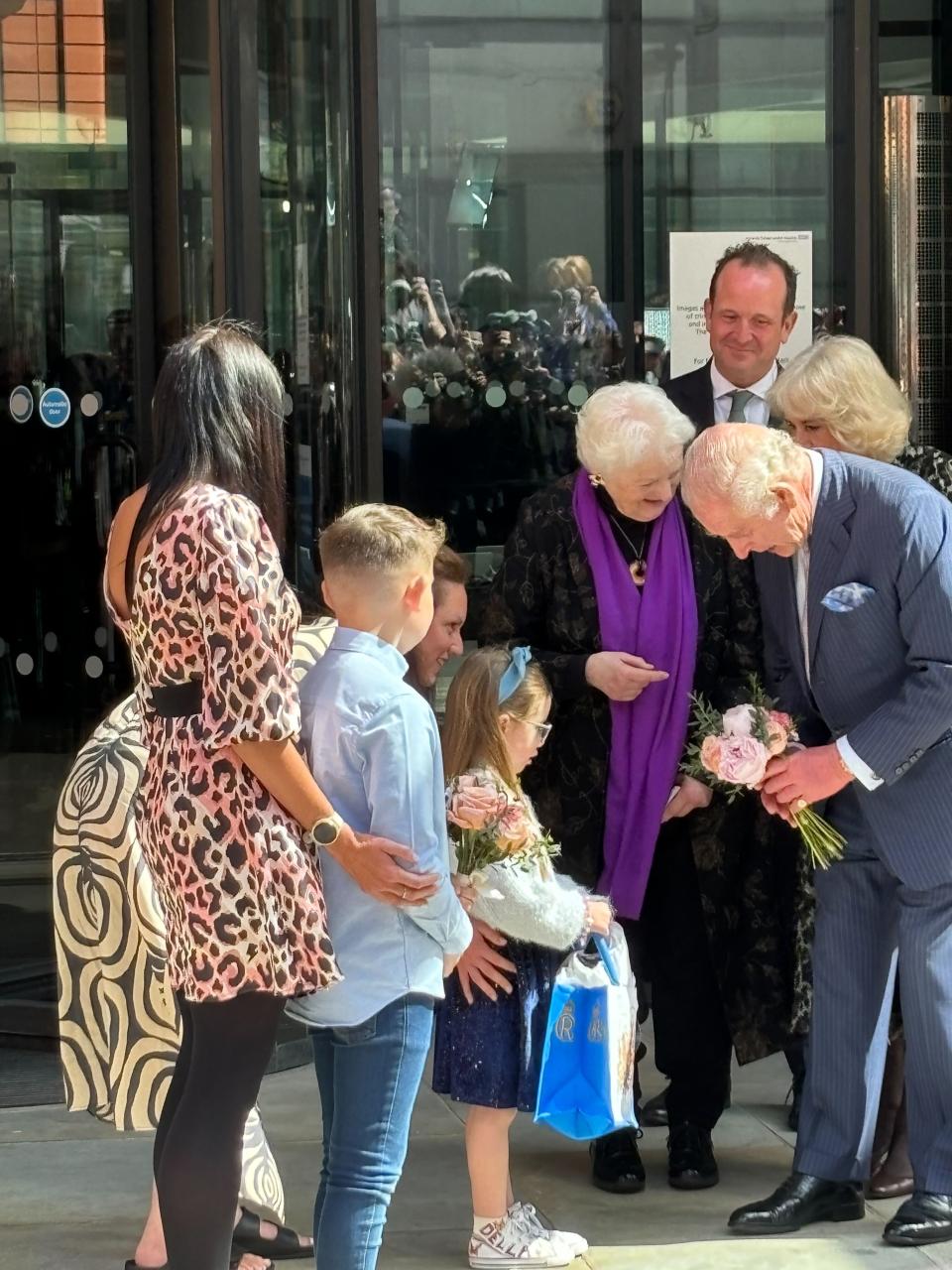 The King and Queen greeted the children who had waited to say goodbye to them (The Independent)