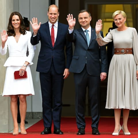 Kate wore the colours of the Polish flag in Warsaw earlier this year - Credit: AFP