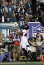 Philadelphia Eagles' Dallas Goedert (88) cannot catch a pass in the end zone over Atlanta Falcons' Duke Riley (42) during the first half of an NFL football game Thursday, Sept. 6, 2018, in Philadelphia. (AP Photo/Michael Perez)