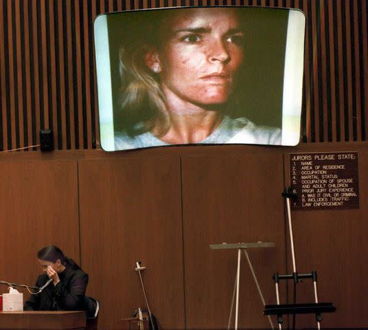 Denise Brown testifies at O.J. Simpson's murder trial as a picture of Nicole Brown Simpson is shown in court.