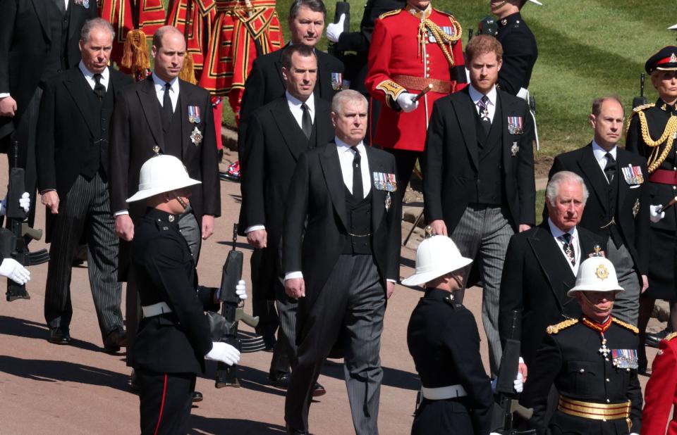 The royal family processes behind Prince Philip's coffin