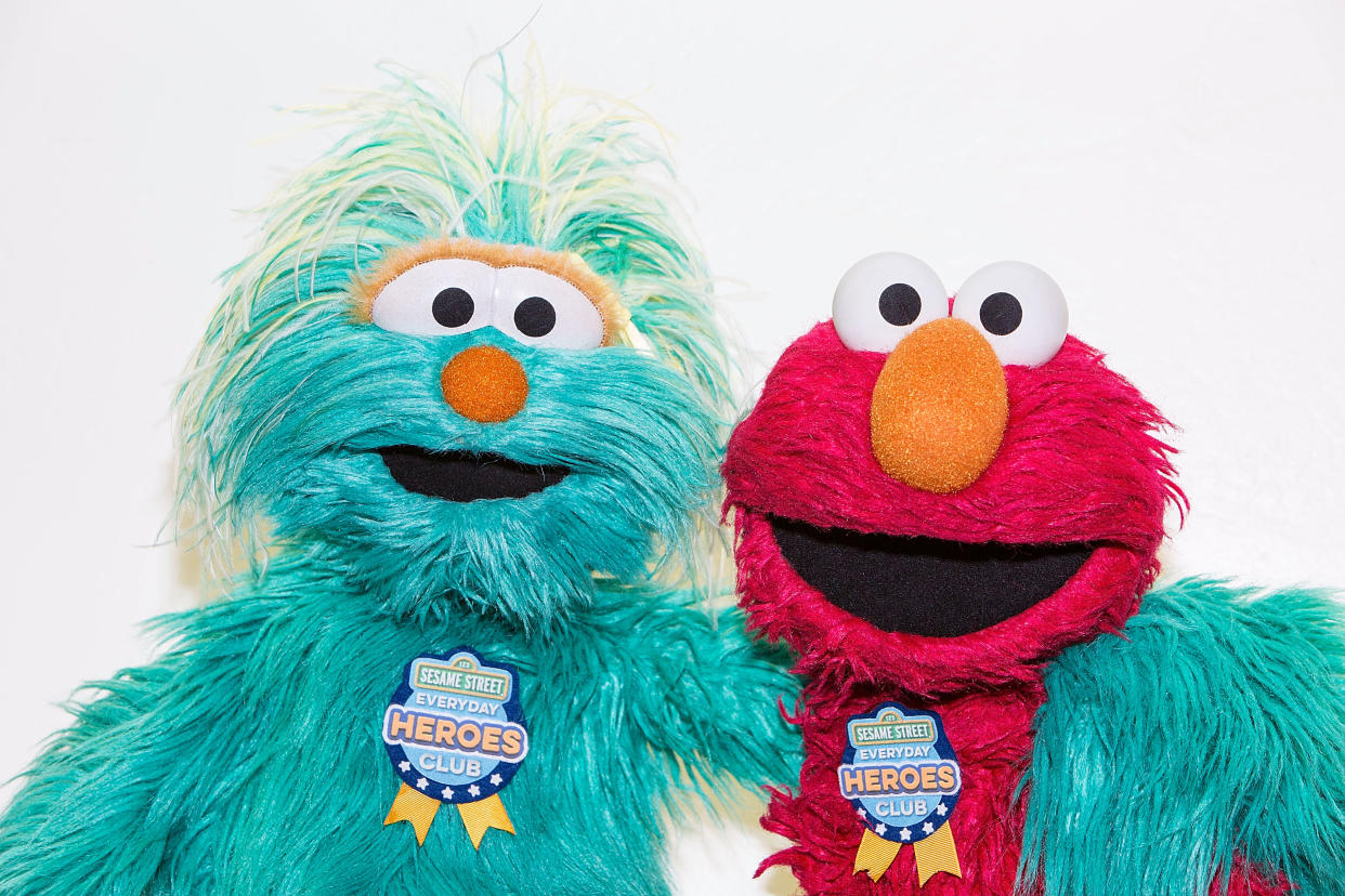 SAN DIEGO, CA - JANUARY 09:  Sesame Street characters Rosita (L) and Elmo pose backstage at Sesame Street and HBO Host Free Museum Day with a special performance by Elmo and Friends at The New Children's Museum on January 9, 2016 in San Diego, California.   (Photo by FilmMagic/FilmMagic)