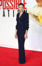 <p>Rebecca Ferguson wears a plunging navy jumpsuit by Diane von Furstenberg.</p><p>Rebecca Ferguson attended the London premiere of her new film, <i>Mission Impossible: Rogue Nation</i>, in a menswear-inspired jumpsuit by Diane von Furstenberg.<br><br></p>