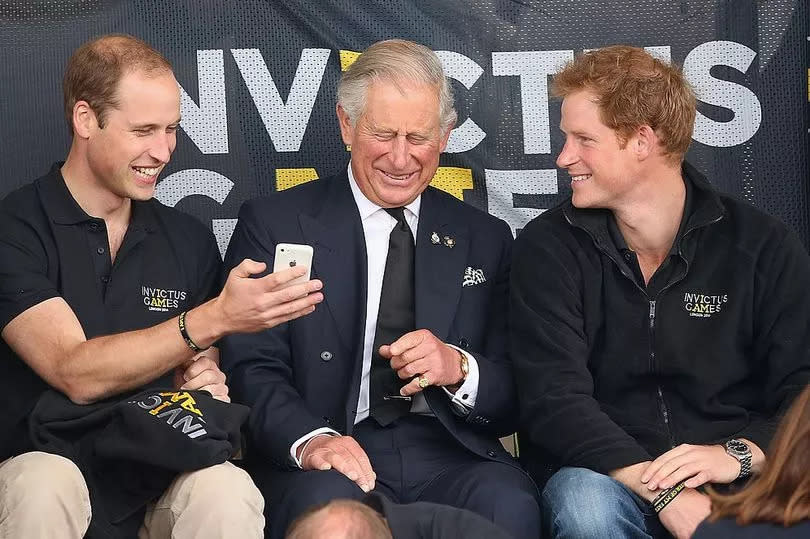 Prince William, King Charles and Prince Harry during the Invictus Games on September 11, 2014