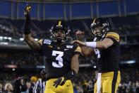 Iowa wide receiver Tyrone Tracy Jr., left, is congratulated by quarterback Nate Stanley after scoring a touchdown during the first half of the Holiday Bowl NCAA college football game against Southern California, Friday, Dec. 27, 2019, in San Diego. (AP Photo/Orlando Ramirez)