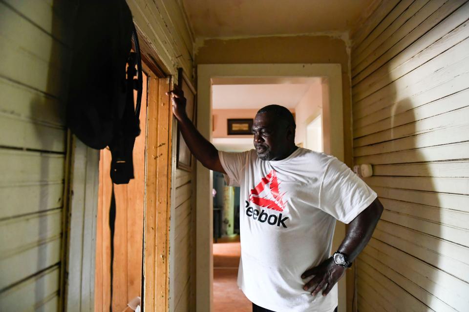 Henry Thomas looks into his grandmother's bedroom where he was born, while visiting the home for the first time since he was incarcerated, in Walterboro, S.C., on Saturday, July 1, 2023.