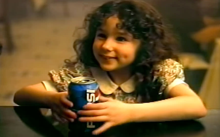 The little girl from those ’90s Pepsi commercials has a famous brother, and you won’t believe who it is