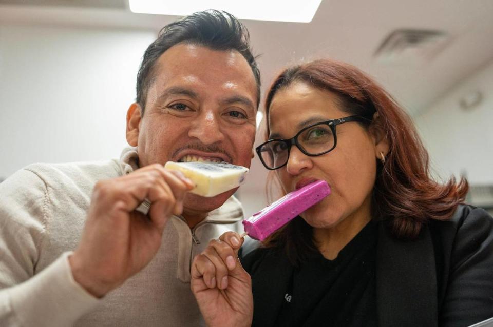 Husband and wife José Luis Valdez and Lucia Fonseca, owners of Palacana, enjoy their paletas.