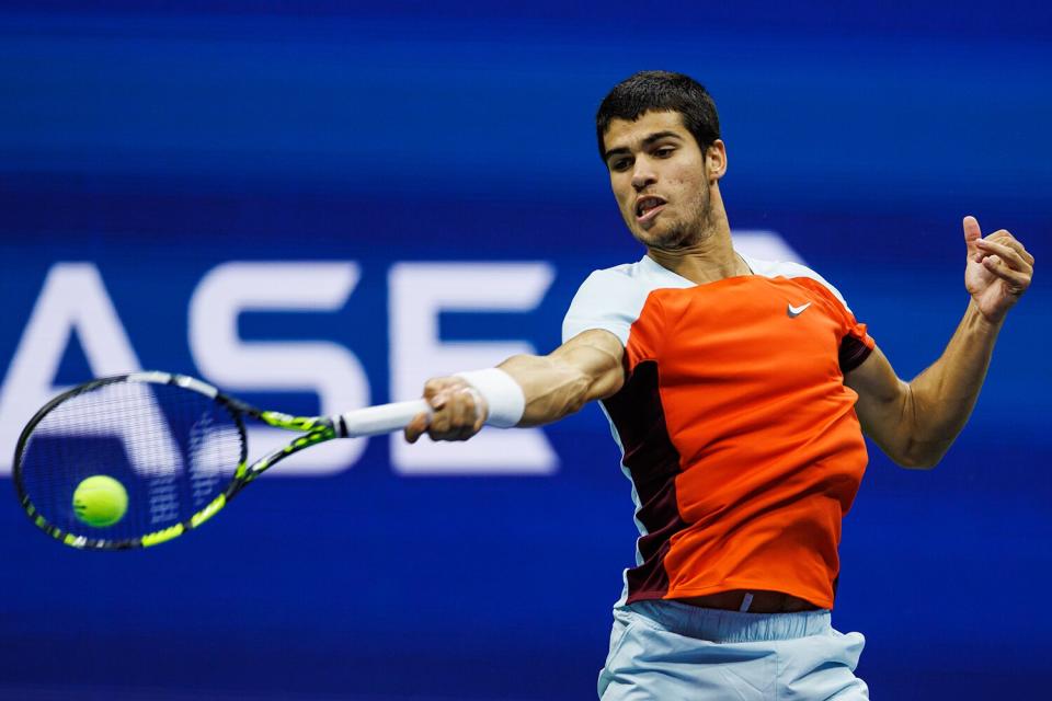 Carlos Alcaraz of Spain hits a forehand against Casper Ruud of Norway in the final of the men's singles at the US Open