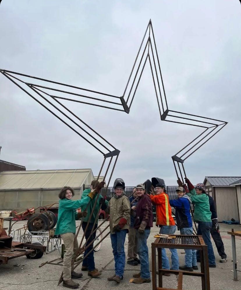 North Lawrence Career Center welding students created the new star which is 20 feet tall and contains 1,000 LED lights.