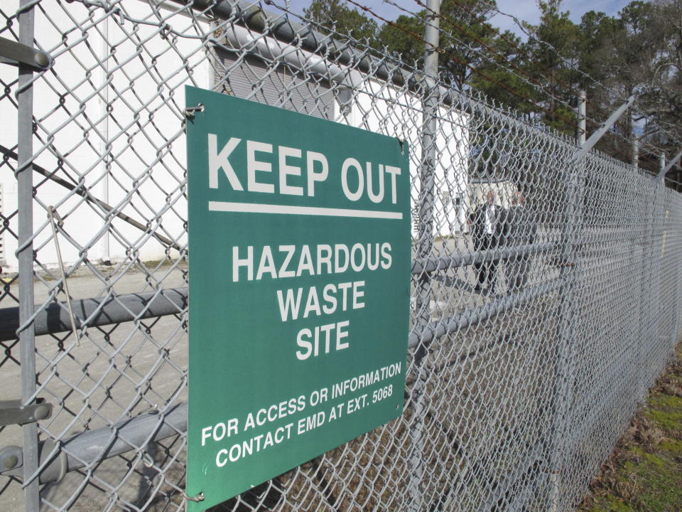 FILE - In a Feb. 27, 2013 file photo, a sign cautions visitors outside a "pump and treat" facility on the Marine base at Camp Lejeune, N.C. Military personnel stationed at Camp Lejeune from 1975 to 1985 had at least a 20% higher risk for a number of cancers than those stationed elsewhere, federal health officials said Wednesday, Jan. 31, 2024, in a long-awaited study of the North Carolina base's contaminated drinking water. (AP Photo/Allen Breed, File)