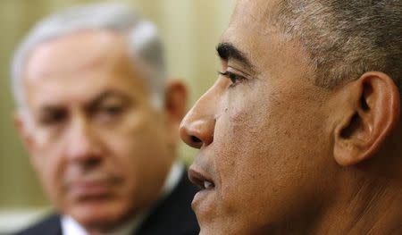 U.S. President Barack Obama meets with Israel's Prime Minister Benjamin Netanyahu (L) in the Oval Office of the White House in Washington October 1, 2014. REUTERS/Kevin Lamarque/Files