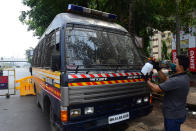 MUMBAI, INDIA - MARCH 26: Mumbai police van sanitisation work done by local corporater from S.V.road bandra during restrictions on citizen's movement on account of section 144 due to COVID 19 pandemic, on March 26, 2020 in Mumbai, India. Prime Minister Narendra Modi on Tuesday announced complete lockdown of the entire country, as part of the governments stringent efforts to tackle coronavirus disease Covid-19. This lockdown will be in place for 21 days and more stringent than Janta Curfew. Although, ration shops, groceries, fruits and vegetable shops, dairy and milk booths, meat and fish shops, animal fodder will remain open during the 21-day lockdown. (Photo by Vijayanand Gupta/Hindustan Times via Getty Images)