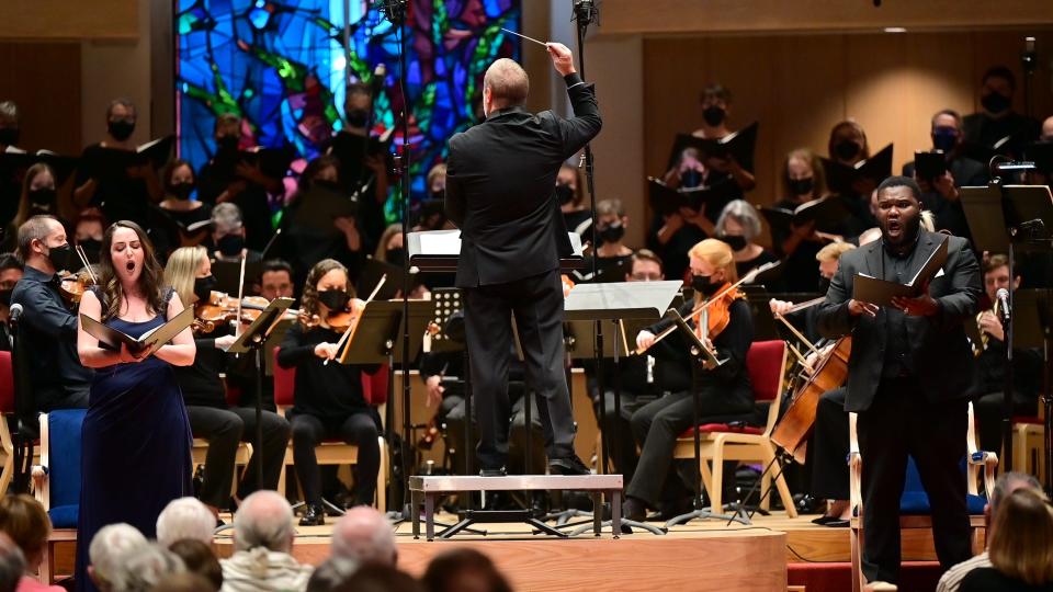 Joseph Caulkins, leads Key Chorale, an orchestra and soloists Suzanne Karpov, left, and Jamal Sarikoki in performances of Ralph Vaughan Williams’ “A Sea Symphony.”