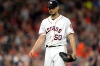 May 12, 2018; Houston, TX, USA; Houston Astros starting pitcher Charlie Morton (50) walks back to the dugout after recording his career-high 14th strikeout against the Texas Rangers during the seventh inning at Minute Maid Park. Mandatory Credit: Erik Williams-USA TODAY Sports