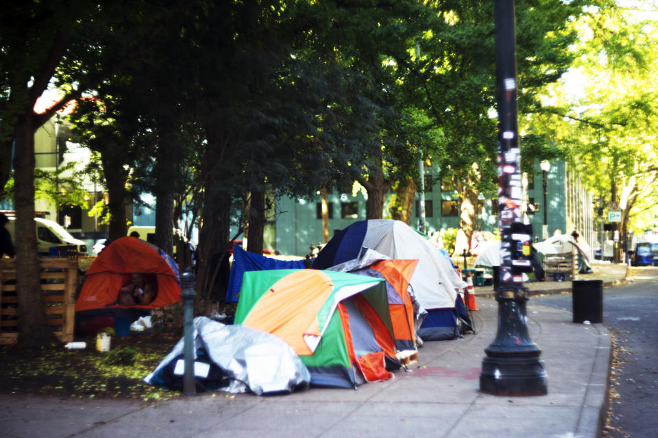 Unhoused people's tents on the street