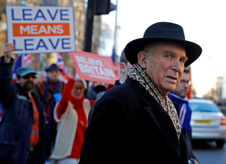 British politician Vince Cable crosses the road outside the Palace of Westminster in London, Britain, December 11, 2018.REUTERS/Phil Noble