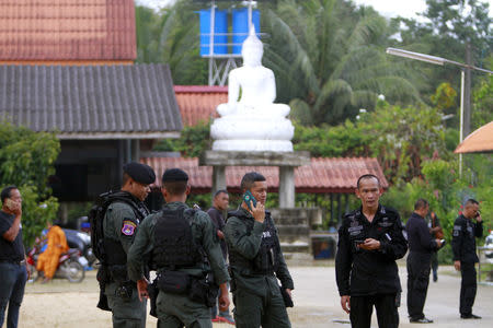 Military police officers are seen at a temple where unknown gunmen shot dead two Buddhist monks and injured two others on Friday in Su-ngai Padi district in the southern province of Narathiwat, Thailand, January 19, 2019. REUTERS/Surapan Boonthanom