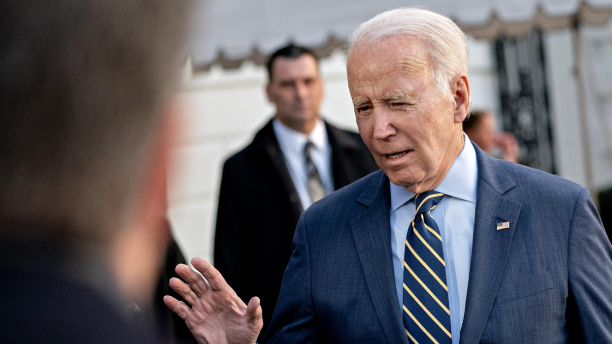 President Biden speaks to members of the media on the South Lawn of the White House.