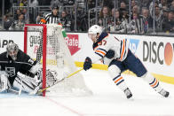 Edmonton Oilers center Connor McDavid, right, scores on Los Angeles Kings goaltender Jonathan Quick during the first period in Game 6 of an NHL hockey Stanley Cup first-round playoff series Thursday, May 12, 2022, in Los Angeles. (AP Photo/Mark J. Terrill)