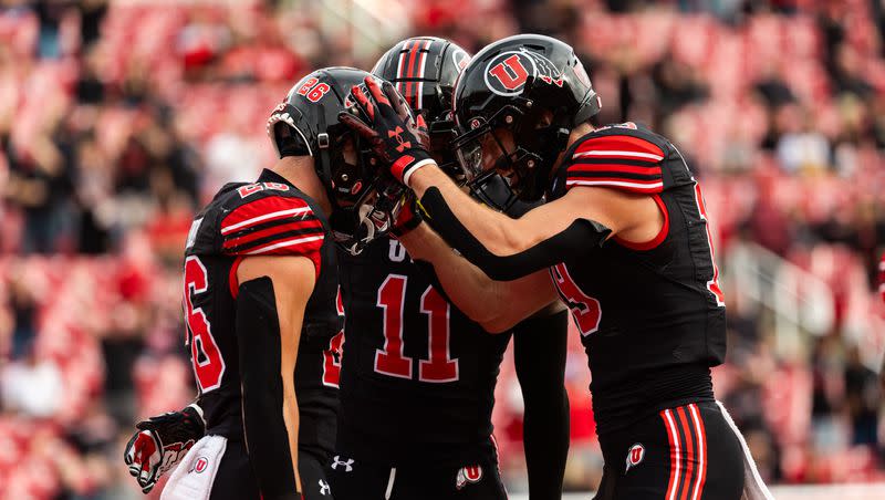 Utah Utes players celebrate Charlie Vincent’s touchdown during a game against the Arizona State Sun Devils at Rice-Eccles Stadium in Salt Lake City on Saturday, Nov. 4, 2023.