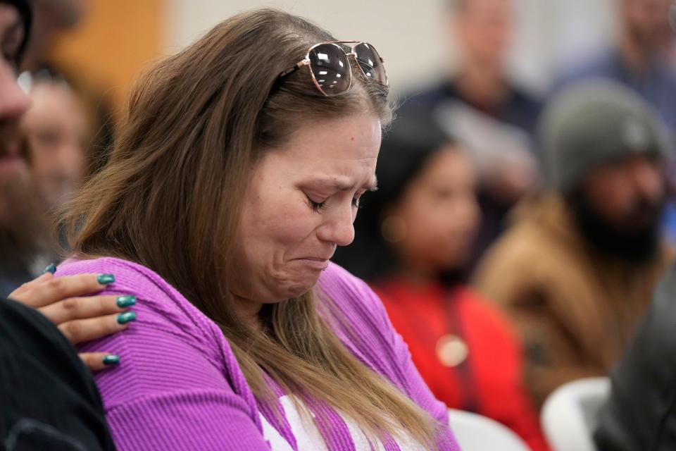 Nikki Cross cries Thursday as she listens to U.S. Attorney General Merrick Garland speak at a news conference about the 2022 shooting in Uvalde that left her son, Uziyah Garcia, dead along with 18 other children and two teachers.