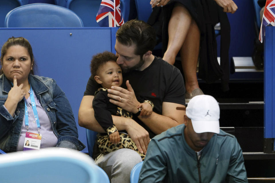 Serena Williams husband Alexis Ohanian holds their daughter Olympia during her match against Britain's Katie Boulter of the Hopman Cup in Perth, Australia, Thursday Jan. 3, 2019. (AP Photo/Trevor Collens)