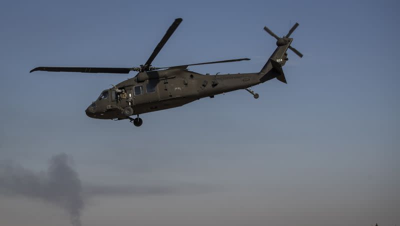 A helicopter takes off from a U.S. military base at an undisclosed location in eastern Syria, on Monday, Nov. 11, 2019.