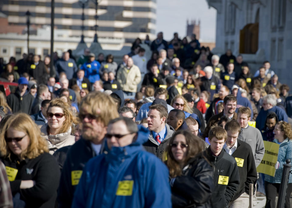 Hundreds march to the Legislative Office Building after a rally outside the Capitol in support of retail alcohol sales on Sundays in Hartford, Conn., Tuesday, Feb. 28, 2012. (AP Photo/Jessica Hill)