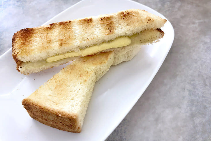 Butter 'kaya'  toast, with the butter generously applied.