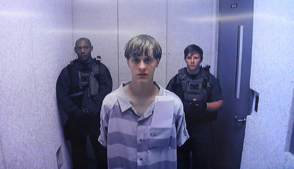 In this image from the video uplink from the detention center to the courtroom, Dylann Roof appears at Centralized Bond Hearing Court June 19, 2015 in North Charleston, South Carolina. 
