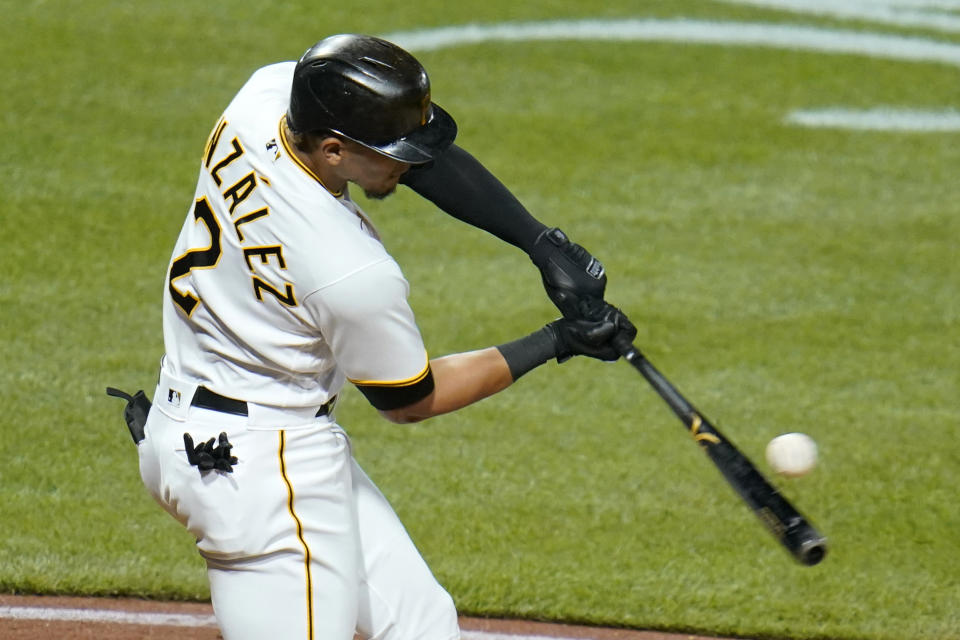 Pittsburgh Pirates' Erik Gonzalez singles off Chicago White Sox relief pitcher Garrett Crochet, driving in two runs, during the seventh inning of a baseball game in Pittsburgh, Tuesday, June 22, 2021. (AP Photo/Gene J. Puskar)