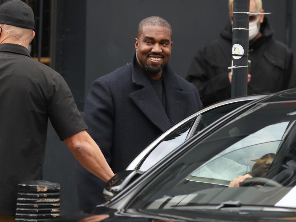 Kanye West is seen leaving Michiko Sushino restaurant in London with his daughter North West.