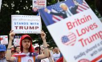 <p>Pro-Trump demonstrators gather outside the U.S. Embassy in London in support of President Trump’s visit to the U.K., July 14, 2018. (Photo: Andy Rain/EPA-EFE/REX/Shutterstock </p>