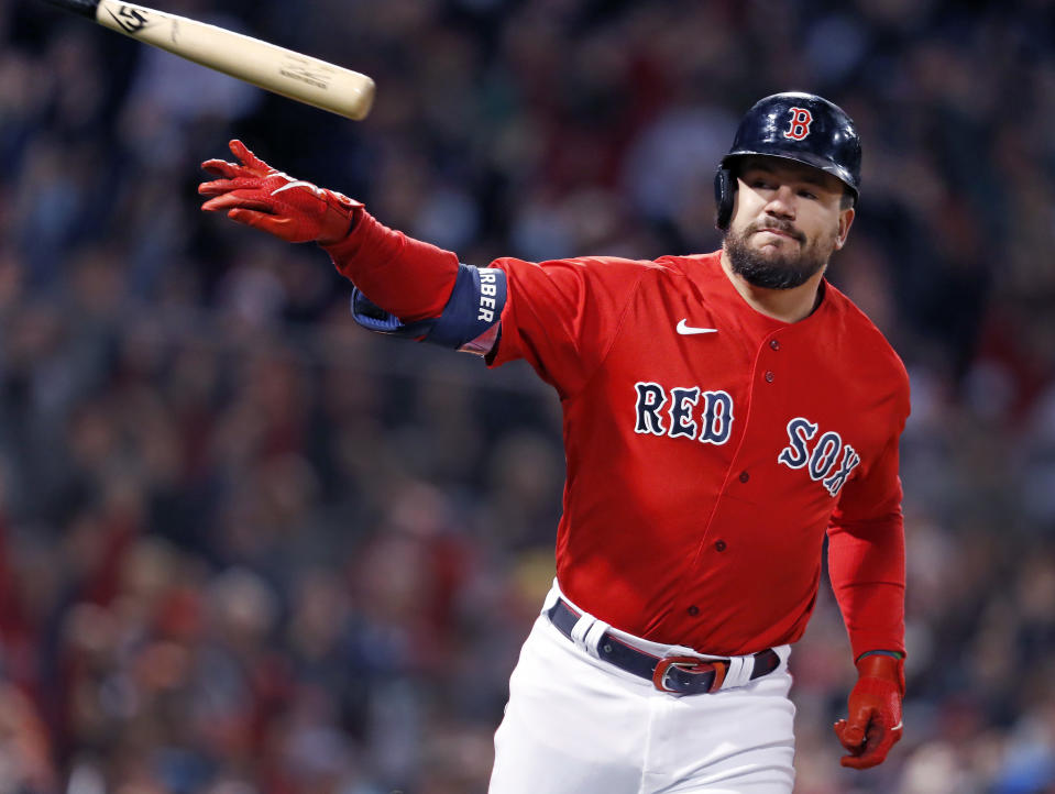 Boston - October 18: The Red Sox Kyle Schwarber tosses his bat away  following his bottom of the second inning grand slam home run. The Boston Red Sox host the Houston Astros for Game 3 of the ALCS at Fenway Park in Boston on Oct. 18, 2021. (Photo by Jim Davis/The Boston Globe via Getty Images)