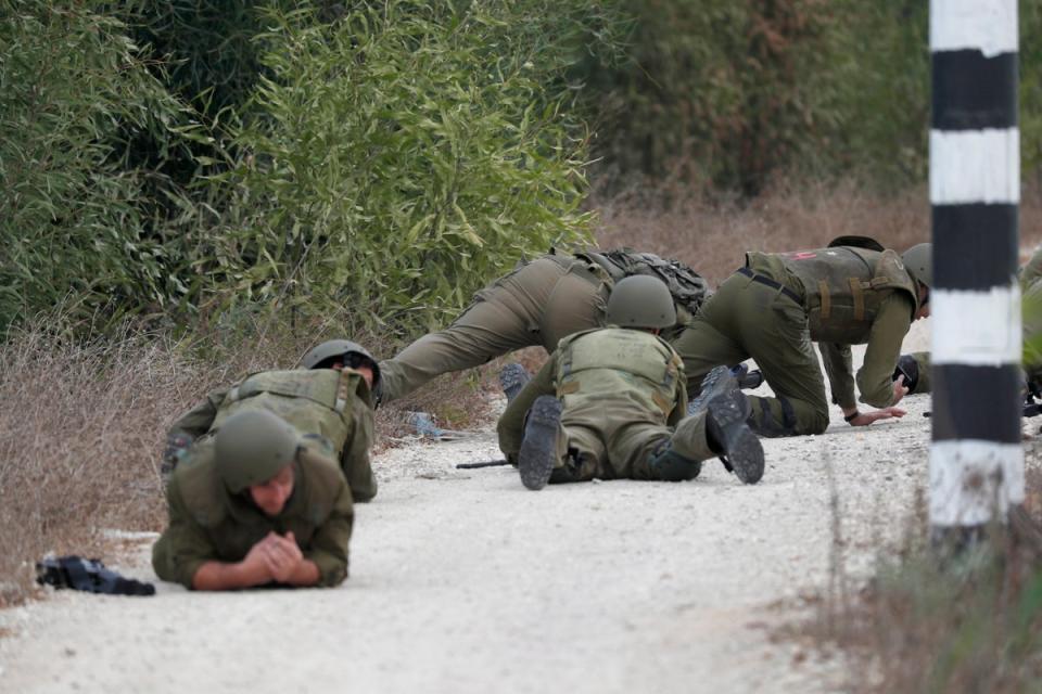 Israeli military tries to strengthen borders with Gaza as battle enters third day (EPA)